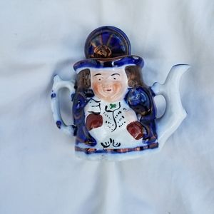 Miniature Toby teapot two sided